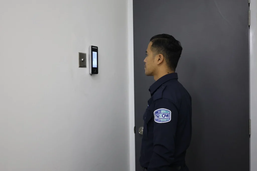 SECOM Malaysia security officer using an access control system for banks