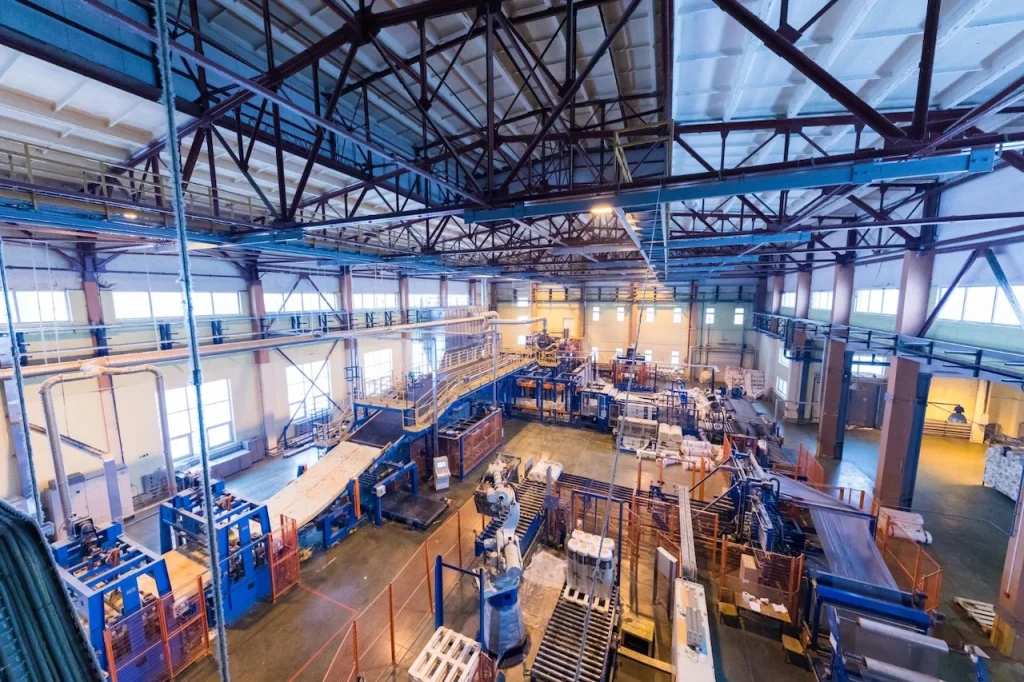 Factory production floor where long walking distances affect how quickly staff can reach an AED