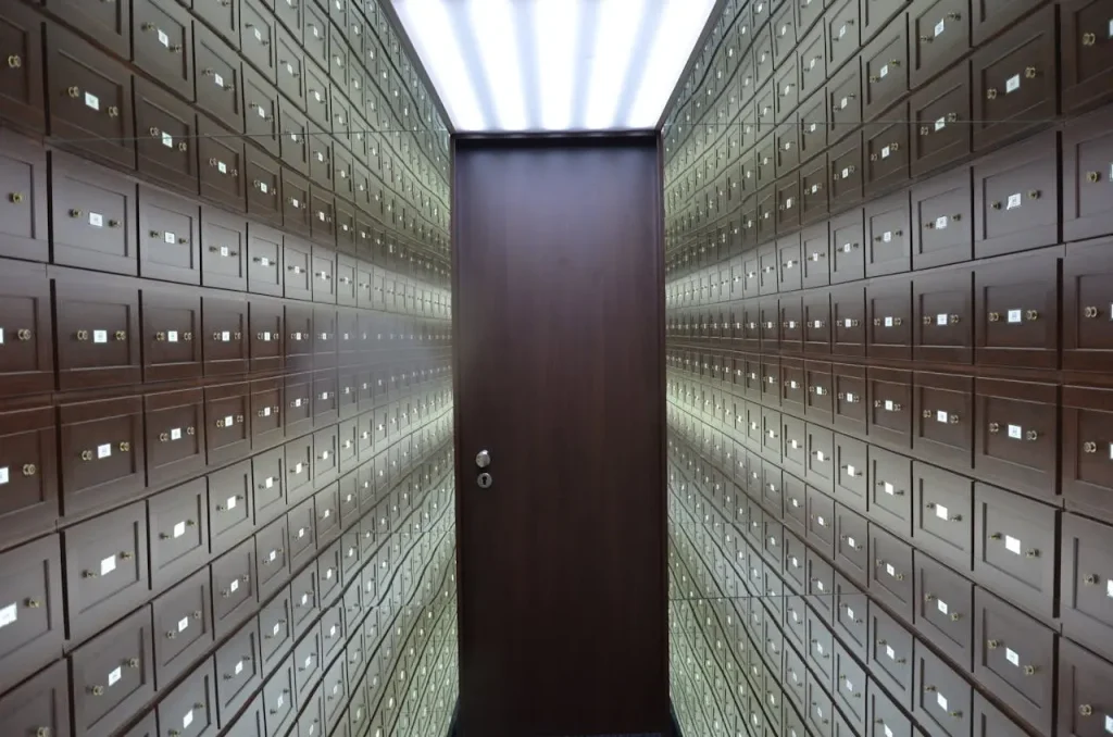 Bank vault safety deposit boxes protected by intrusion detection systems for secure restricted area monitoring