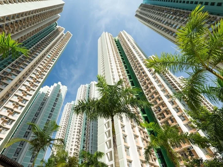 condominium-apartment-security-malaysia High-rise condominium and apartment towers surrounded by palm trees